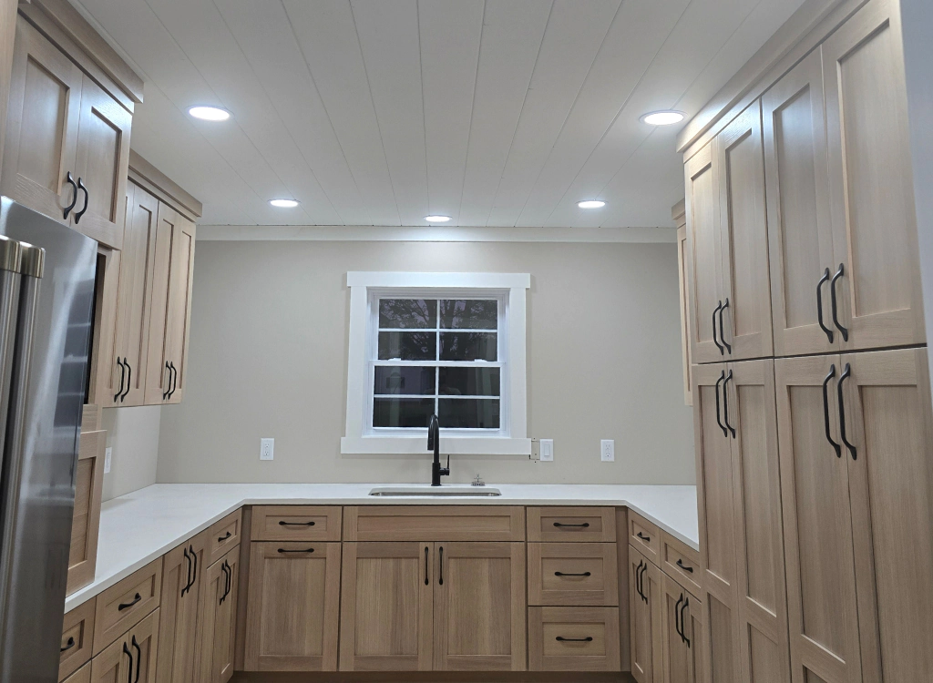 kitchen with newly installed lighting system